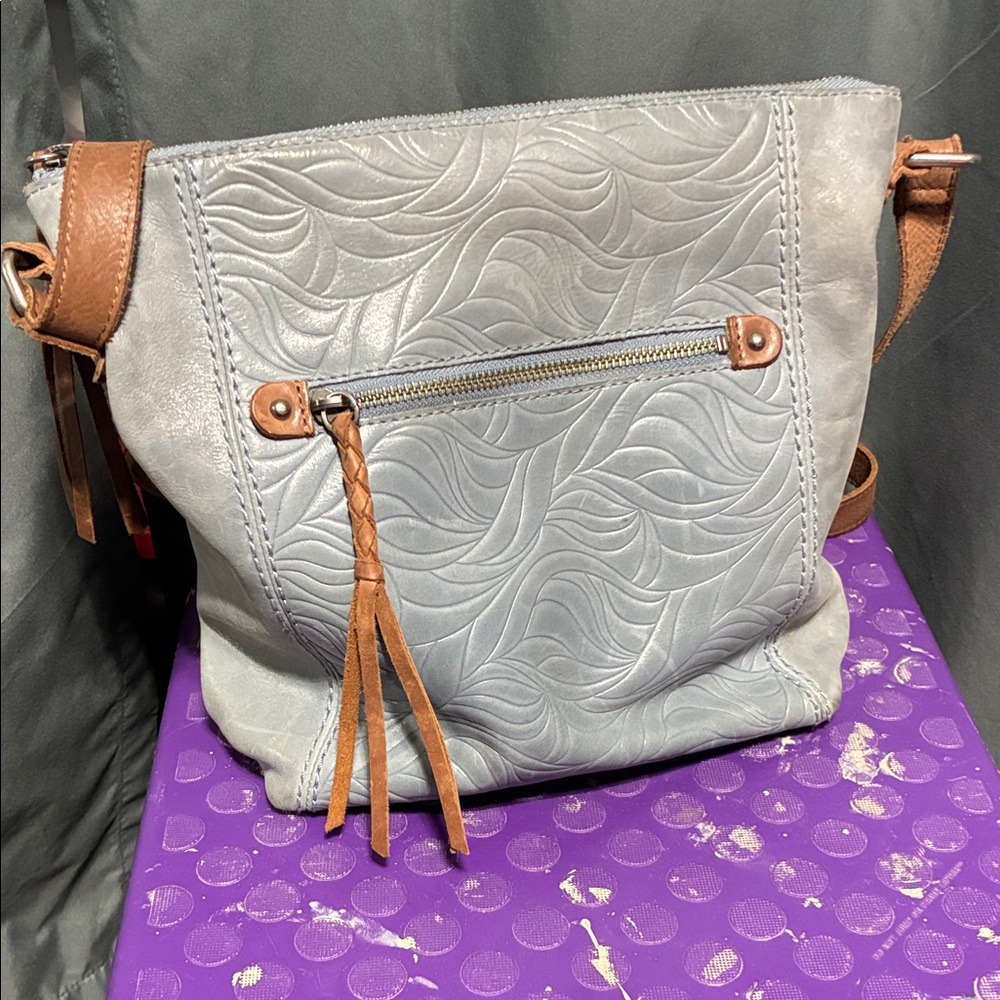 Light blue leather crossbody bag with Tan Accents